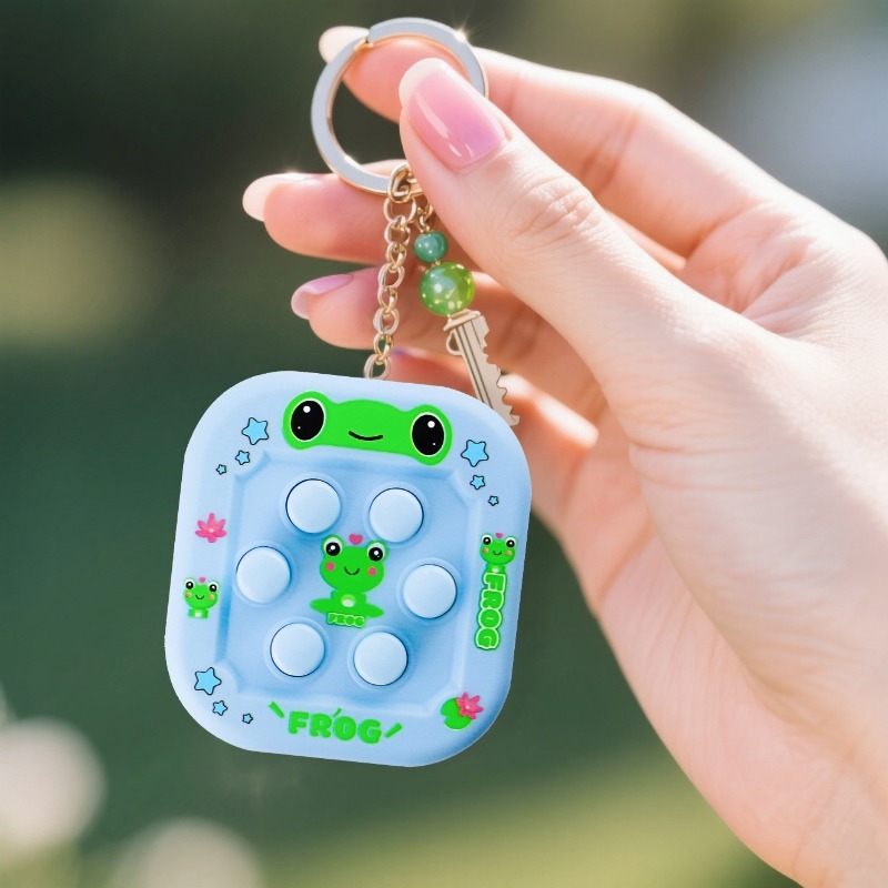 เครื่องเล่นเกมพกพาแบบการ์ตูน W - Gaming Console Keychain บทวิจารณ์และราคา
